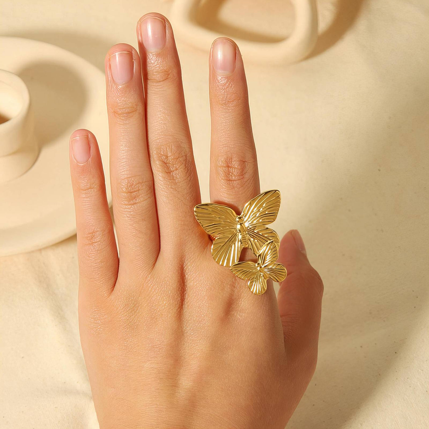 Double Butterflies finger ring, Intensity